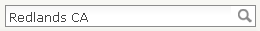 Das Feld "Adresse oder Ort suchen" mit den eingegebenen Wörtern Redlands CA